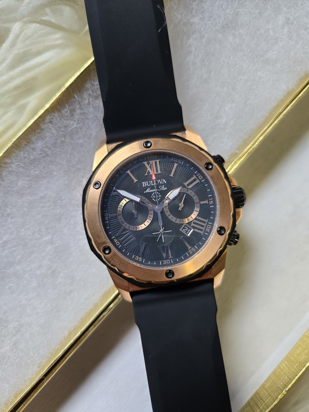 Bulova Men's Chronograph Watch – Black Dial, Rose Gold Bezel, Roman Numerals